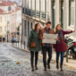 Travelers walking on Lisbon historic street