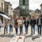 Tourists on city guided tour in Europe