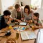 Family planning European trip at kitchen table