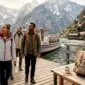 1779370556045_Travelers arriving at Hallstatt village dock 85x85