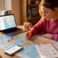Traveler marking multi-day tour route on map