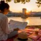 1781273254537_Traveler studying Budapest map at outdoor cafe 85x85