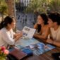 1781701015535_Travel agent consulting clients in office 85x85