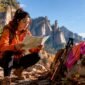 1782023159210_Solo hiker reading map on forest trail 1 85x85