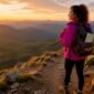 1783977751957_Woman adjusting backpack at forest trail start 85x85