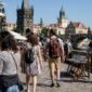 Sunrise over Prague Charles Bridge and river