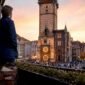 1784920224576_Traveler viewing Prague Old Town Square and Astronomical Clock 85x85