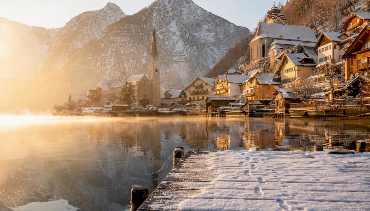 Snowy Hallstatt village lakeside winter morning