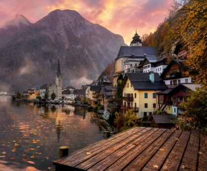 Hallstatt village by misty lake at sunrise