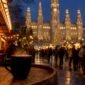 1787035087401_Lit wooden stalls at Vienna Christmas market evening 85x85