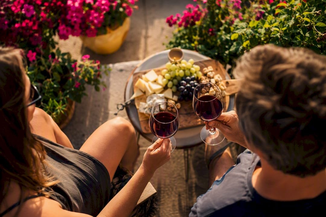 Wine glasses and local cheese platter
