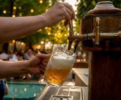 Bartender pouring Czech 12° beer with foam head