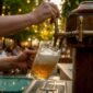 1787391926040_Bartender pouring Czech 12 beer with foam head 85x85