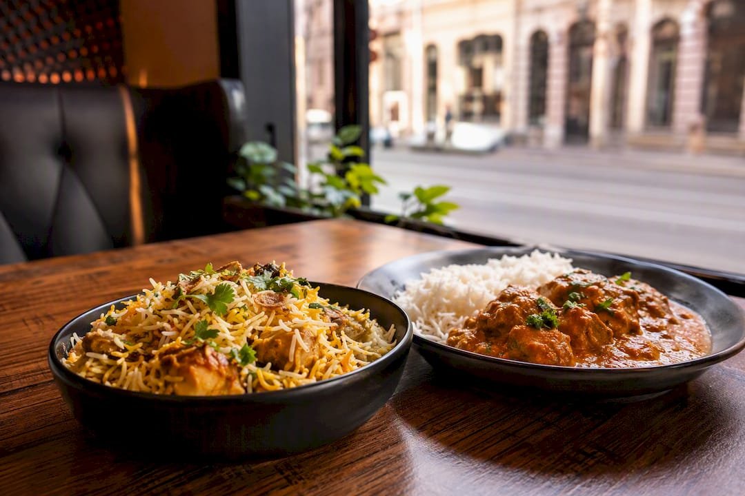 South Asian halal biryani and tikka masala overhead