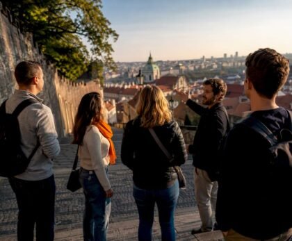 Guide leading travelers through historic Prague