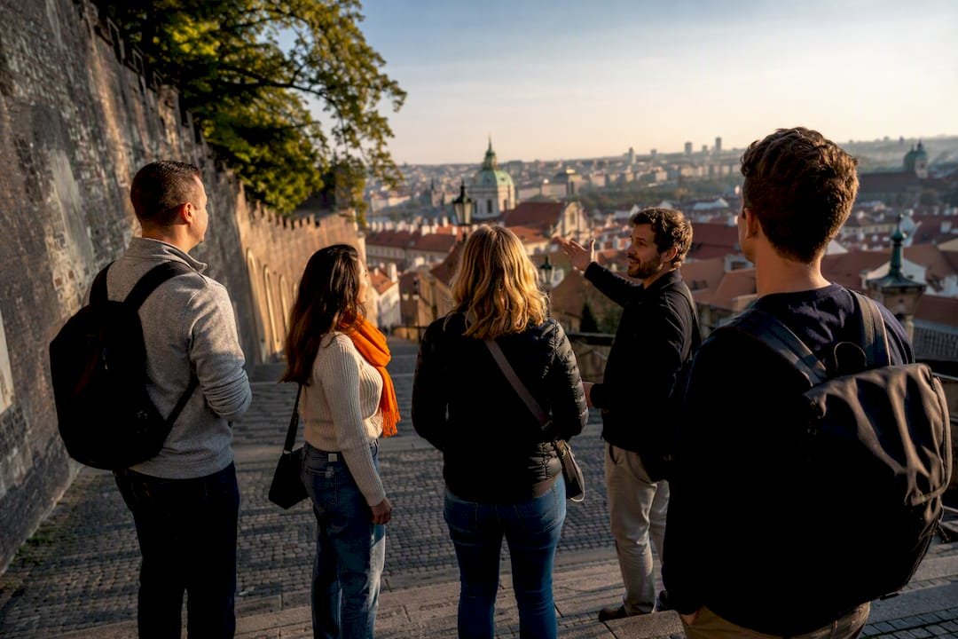 Guide leading travelers through historic Prague