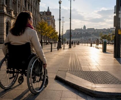 Wheelchair traveler on accessible Budapest boulevard
