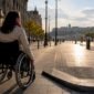 Wheelchair traveler on accessible Budapest boulevard