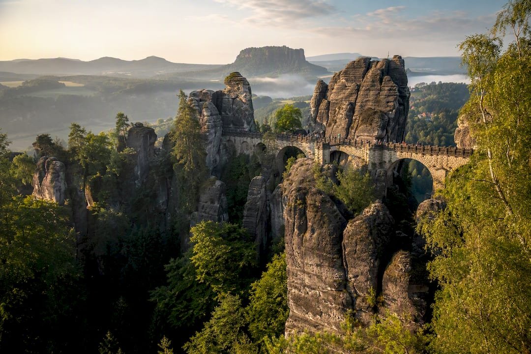 Bastei sandstone bridge above forested valley