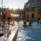 1789245648107_Visitors at a grand Budapest thermal bath 85x85