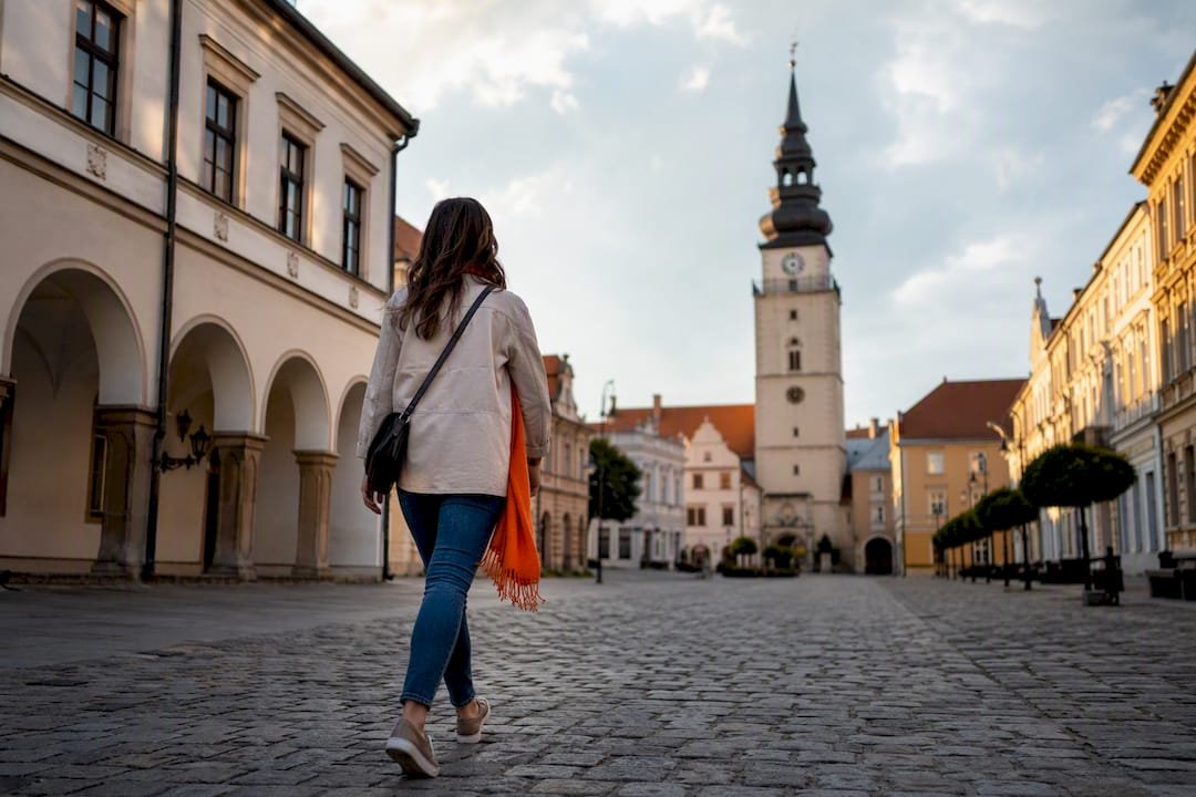 Traveler exploring Trnava historic square