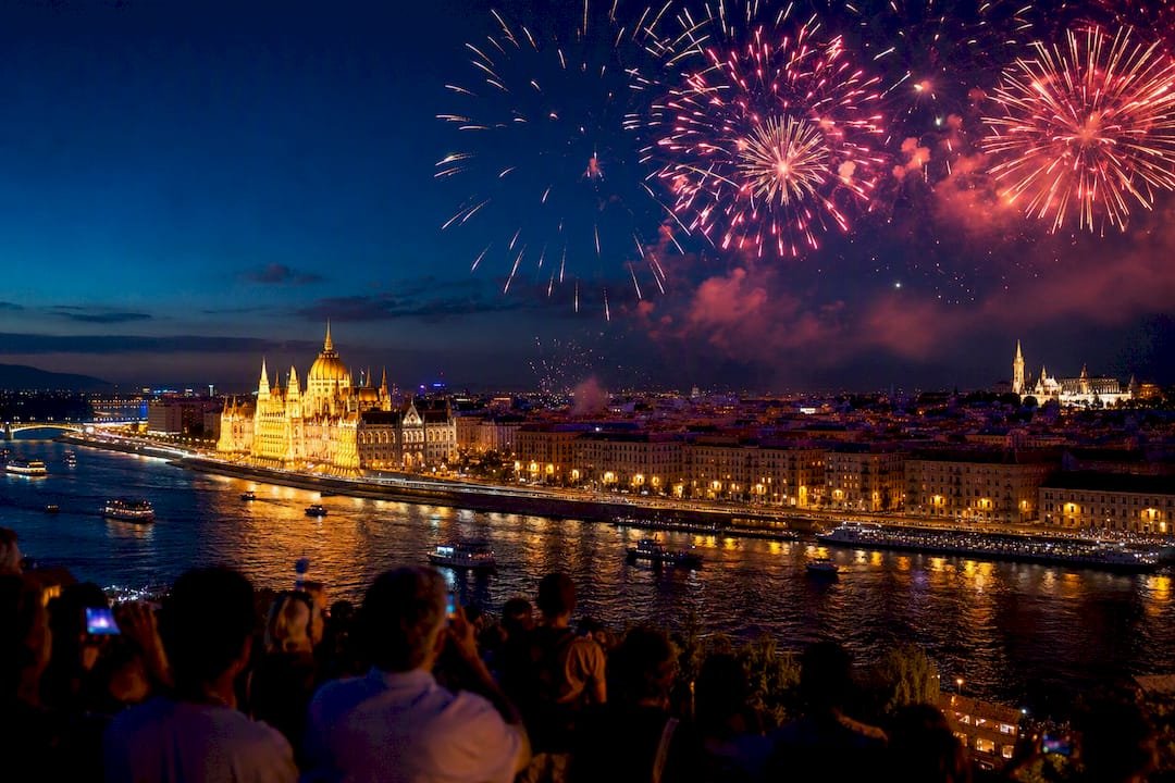 Fireworks above Budapest skyline at dusk